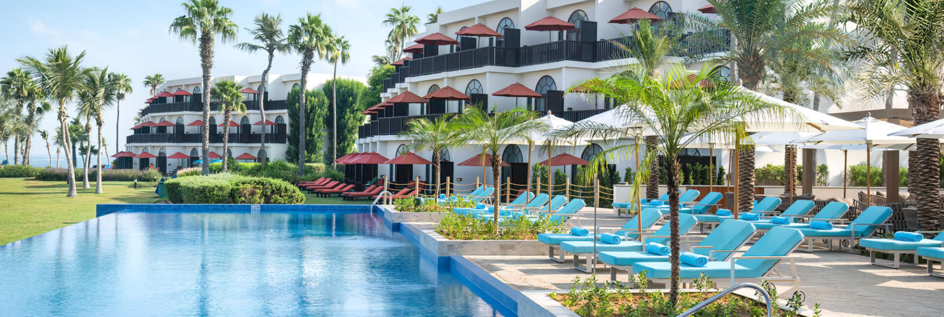 JA Palm Tree Court Tamr Pool.jpg