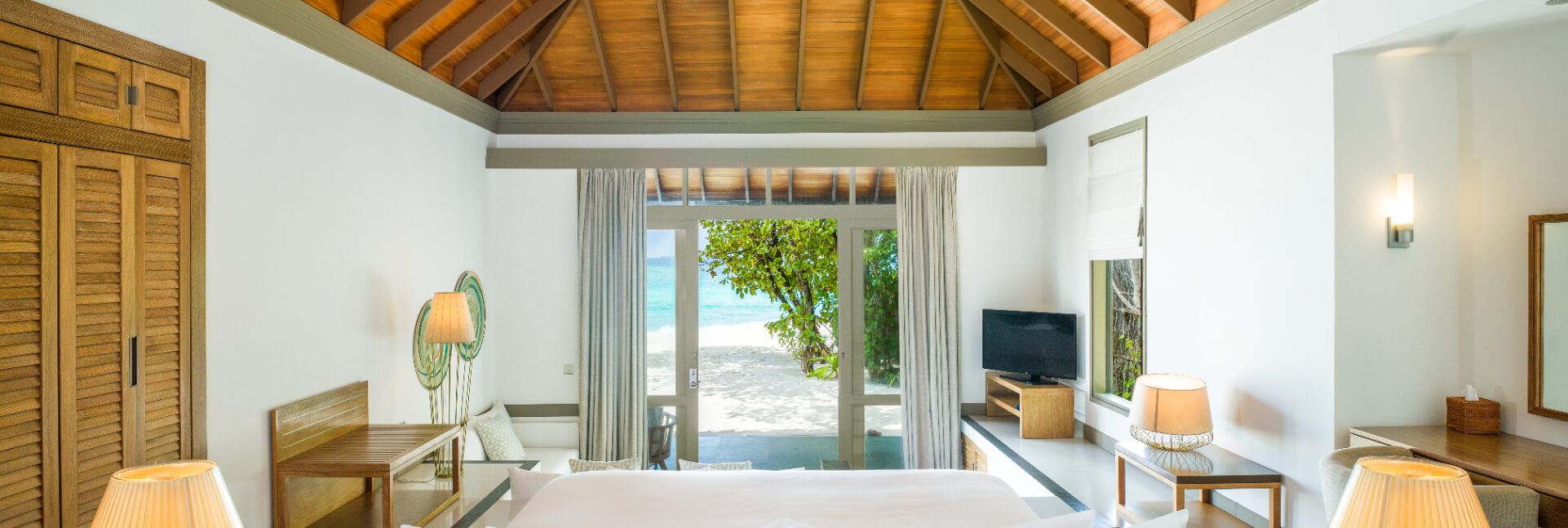 JA_Manafaru_Accommodation_Beach_Villa_Bedroom View 2.jpg