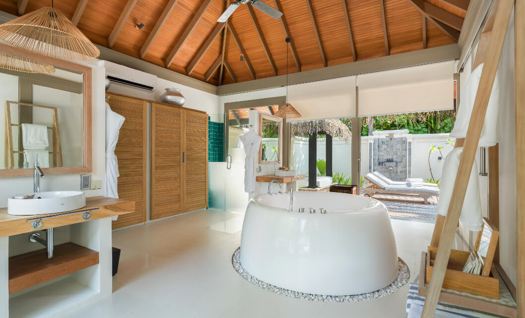 JA_Manafaru_Accommodation_Deluxe Beach Villa_Private Pool_Bathroom.jpg